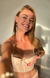 A mommy who likes to smile and get naughty when she's home alone.