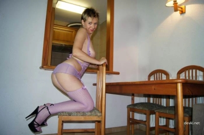 Sex photo of a mature woman on the table