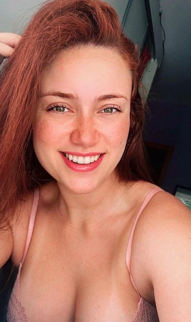 Ginger locks, fair skin, and au naturel beauty