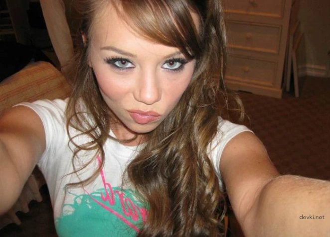 Homemade porn of a young cutie with a shaved pussy