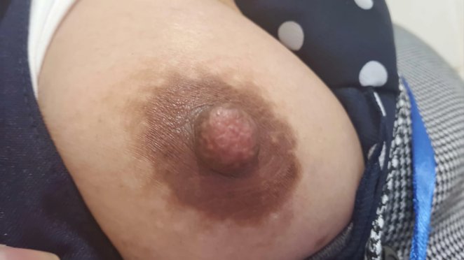 Unexpected One Boob Office Flash: A Close-Up View