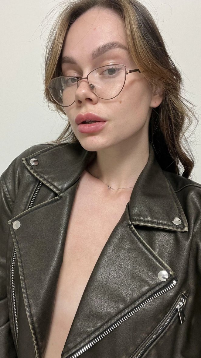 Delicate Girl in Spectacles