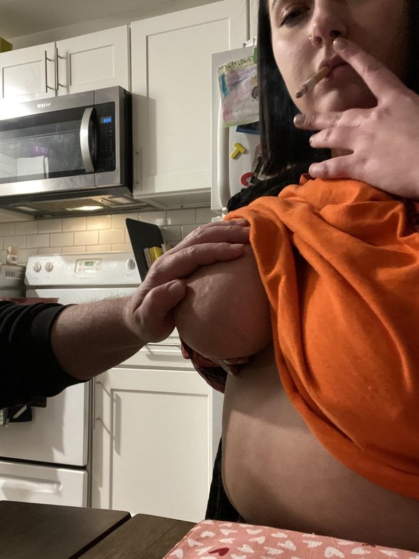 Let a friend play with my titties while I smoked