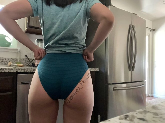 Petite woman posing suggestively, hinting she is the evening meal