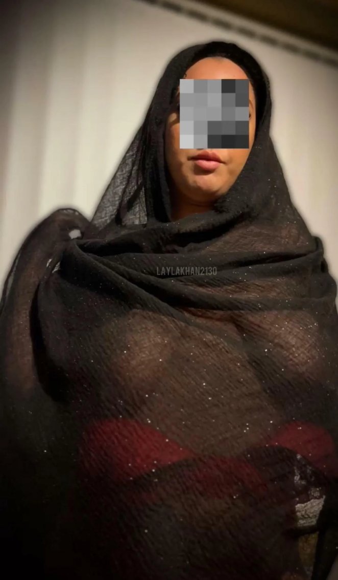 Young Indian woman in hijab posing confidently for the camera