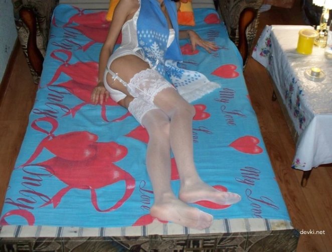 A thin brown-haired woman has sex with a guy