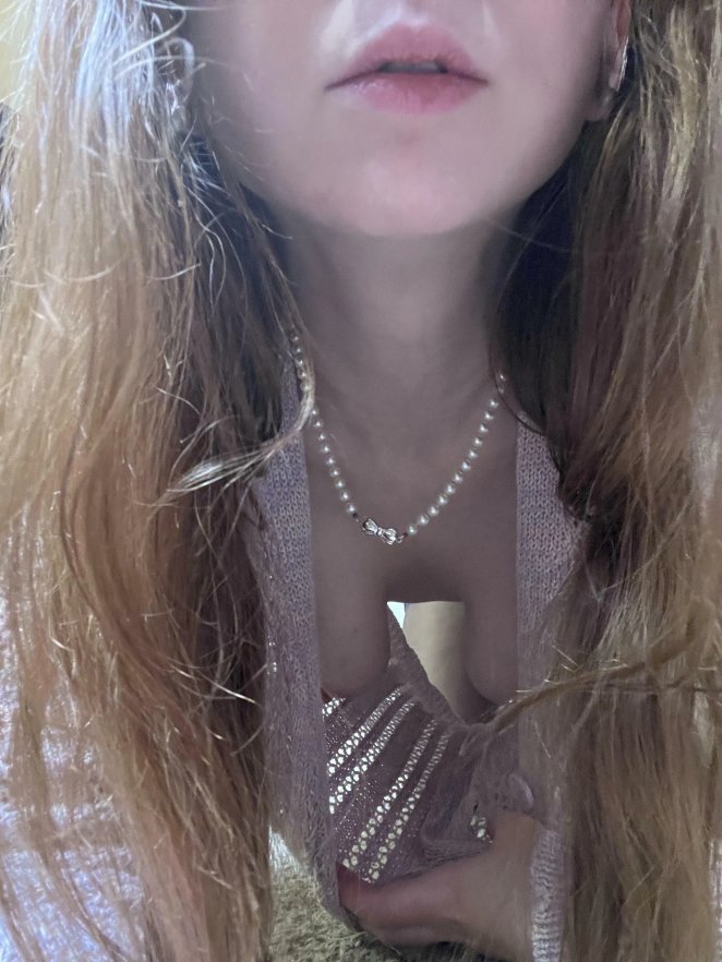 Adorning my pearl necklace on a leisurely day