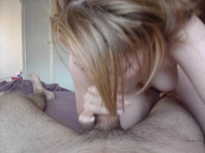 The red-haired girl sucked the guy's penis