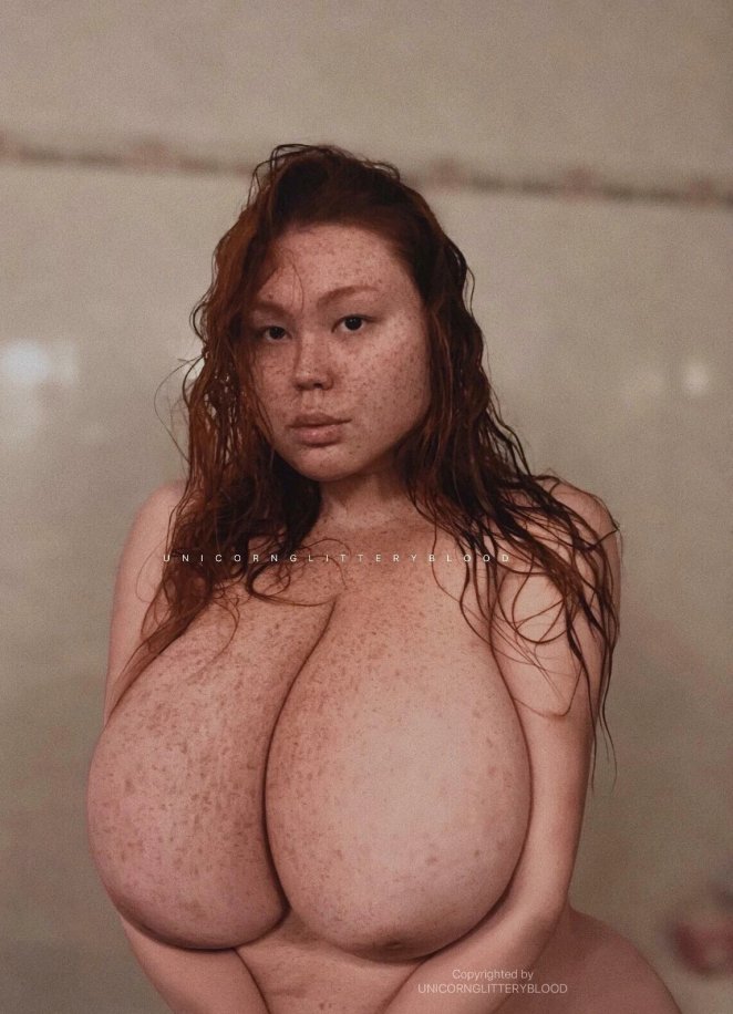 Voluptuous Redhead with Big Breasts