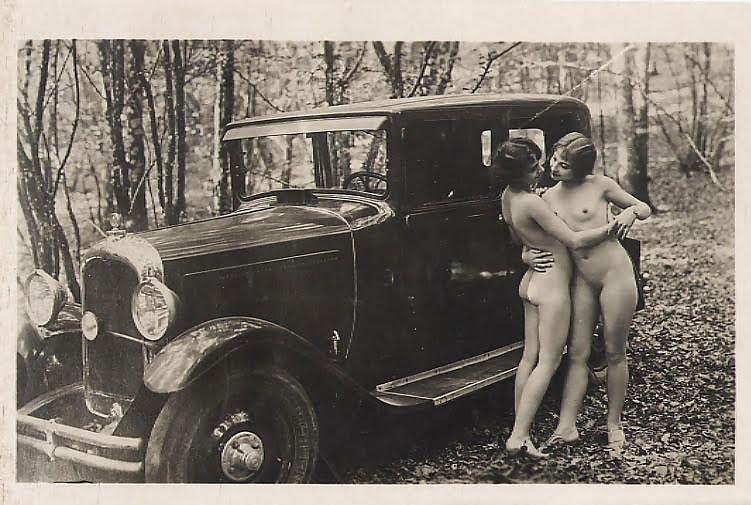 1920s lesbian motorists take a break in the forest.