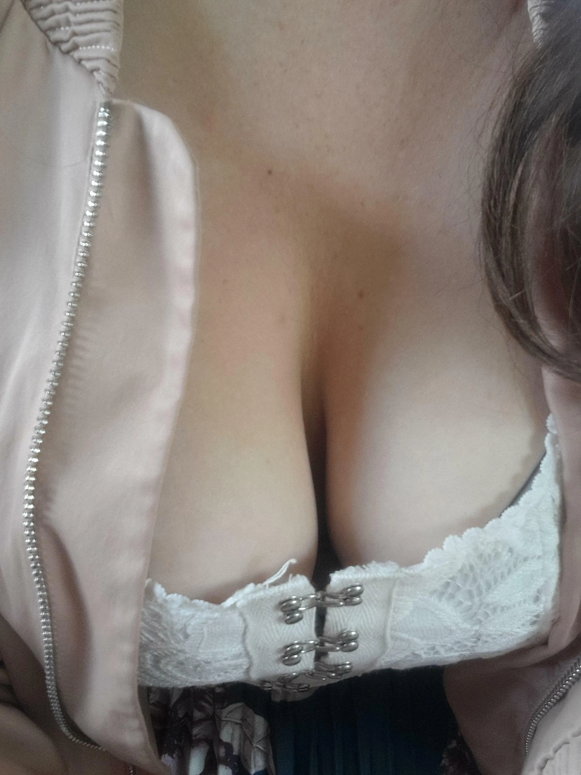 Enjoy a playful glimpse down my blouse.