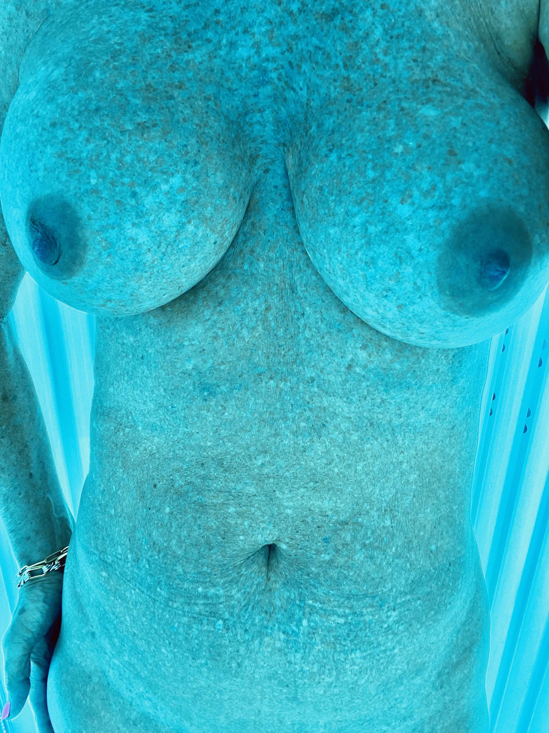 Capturing a moment before my tanning salon self-care ritual