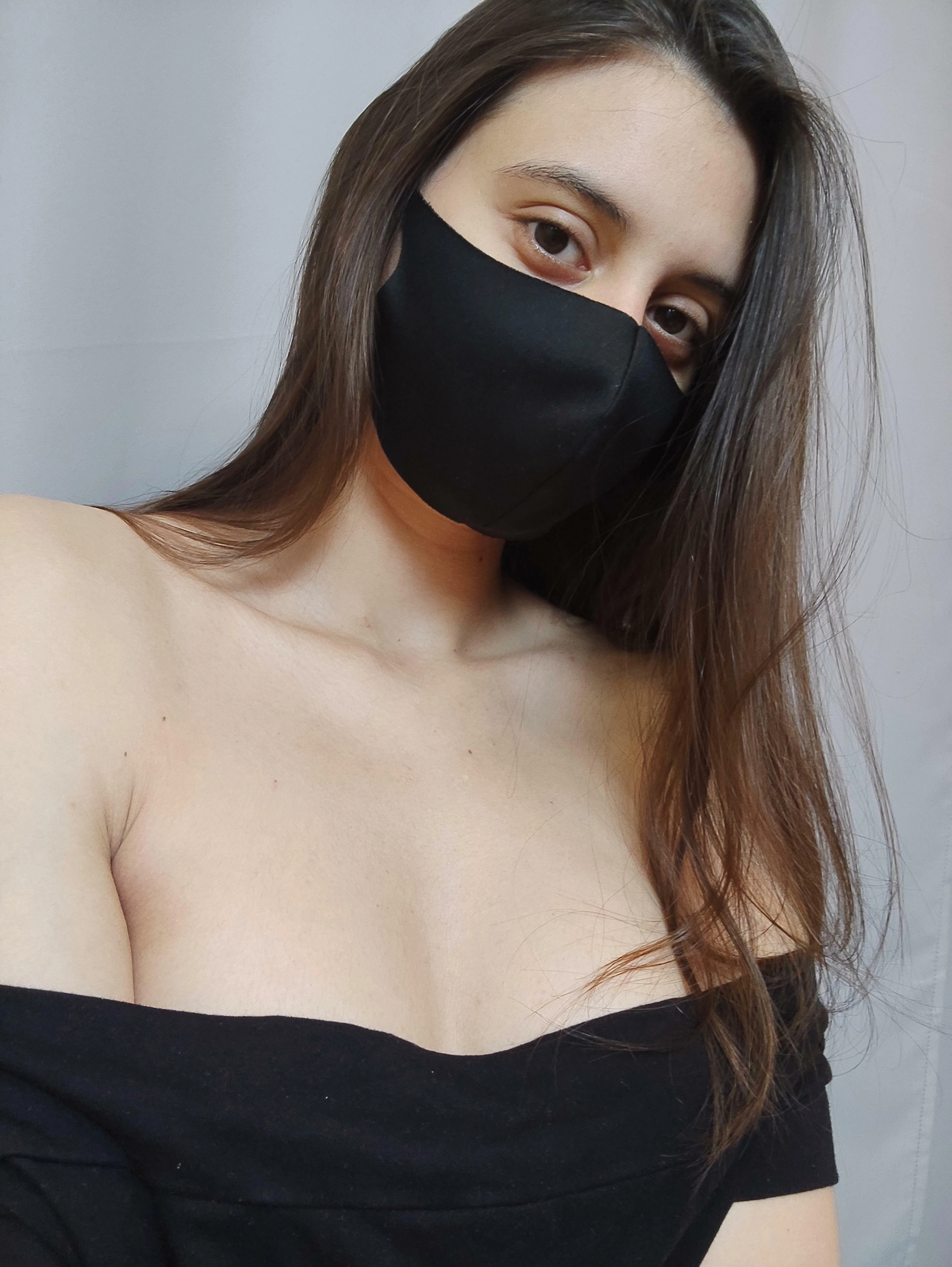 A Peek of Cleavage: Just a Hint, but the Boobs are Still on Display