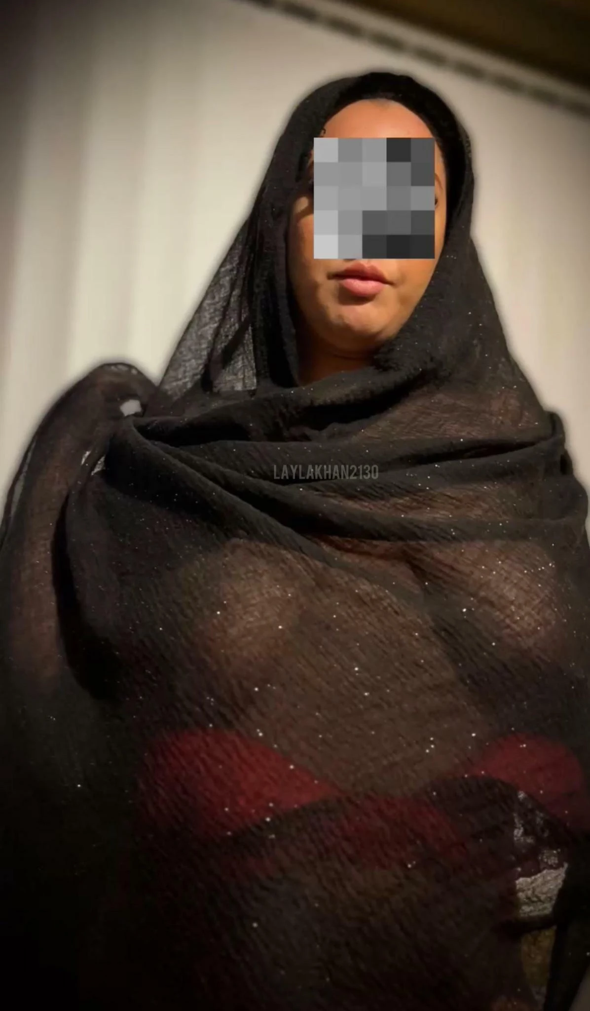 Young Indian woman in hijab posing confidently for the camera